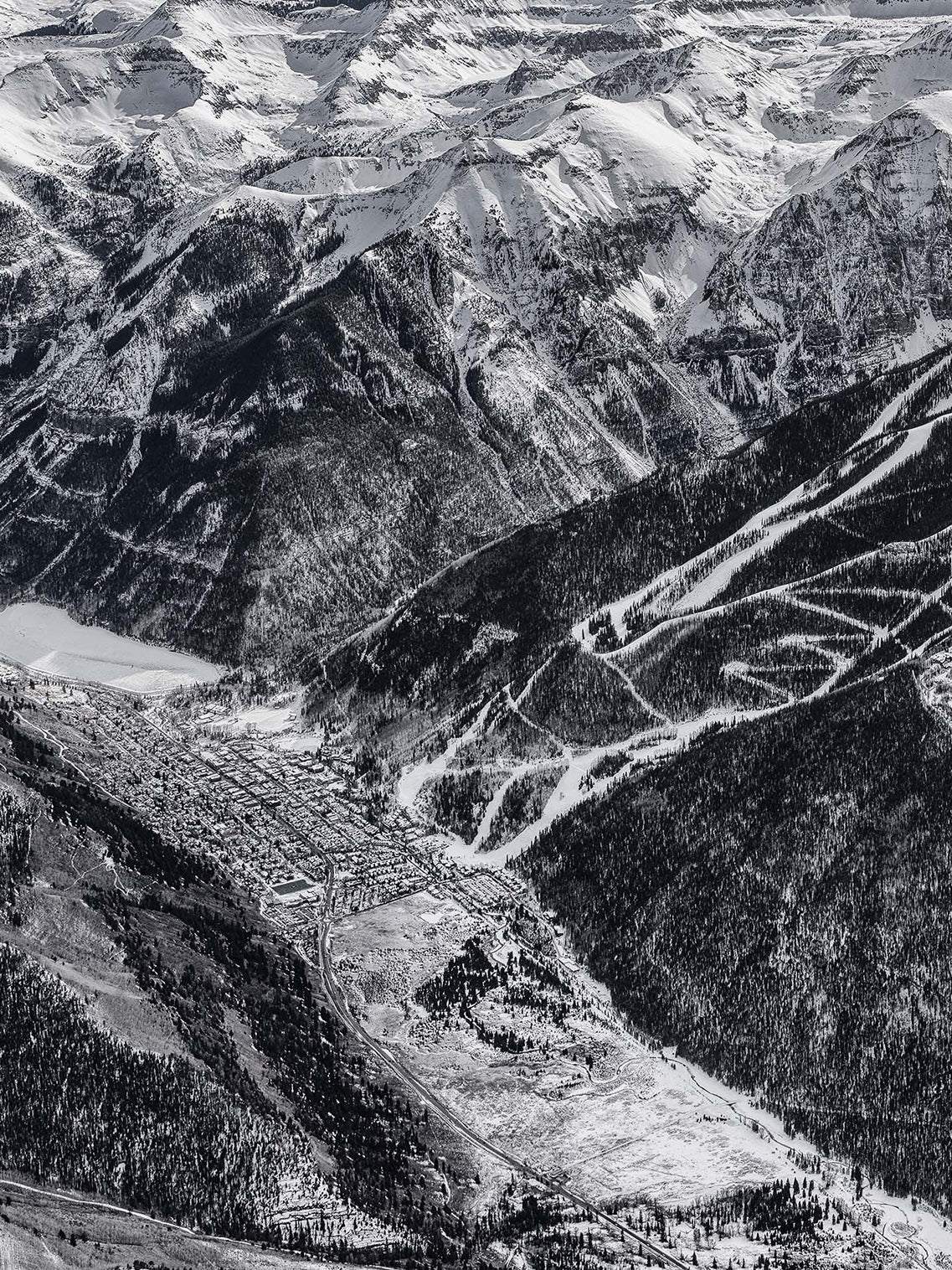 Aerial image of Telluride area with ski runs leading to town