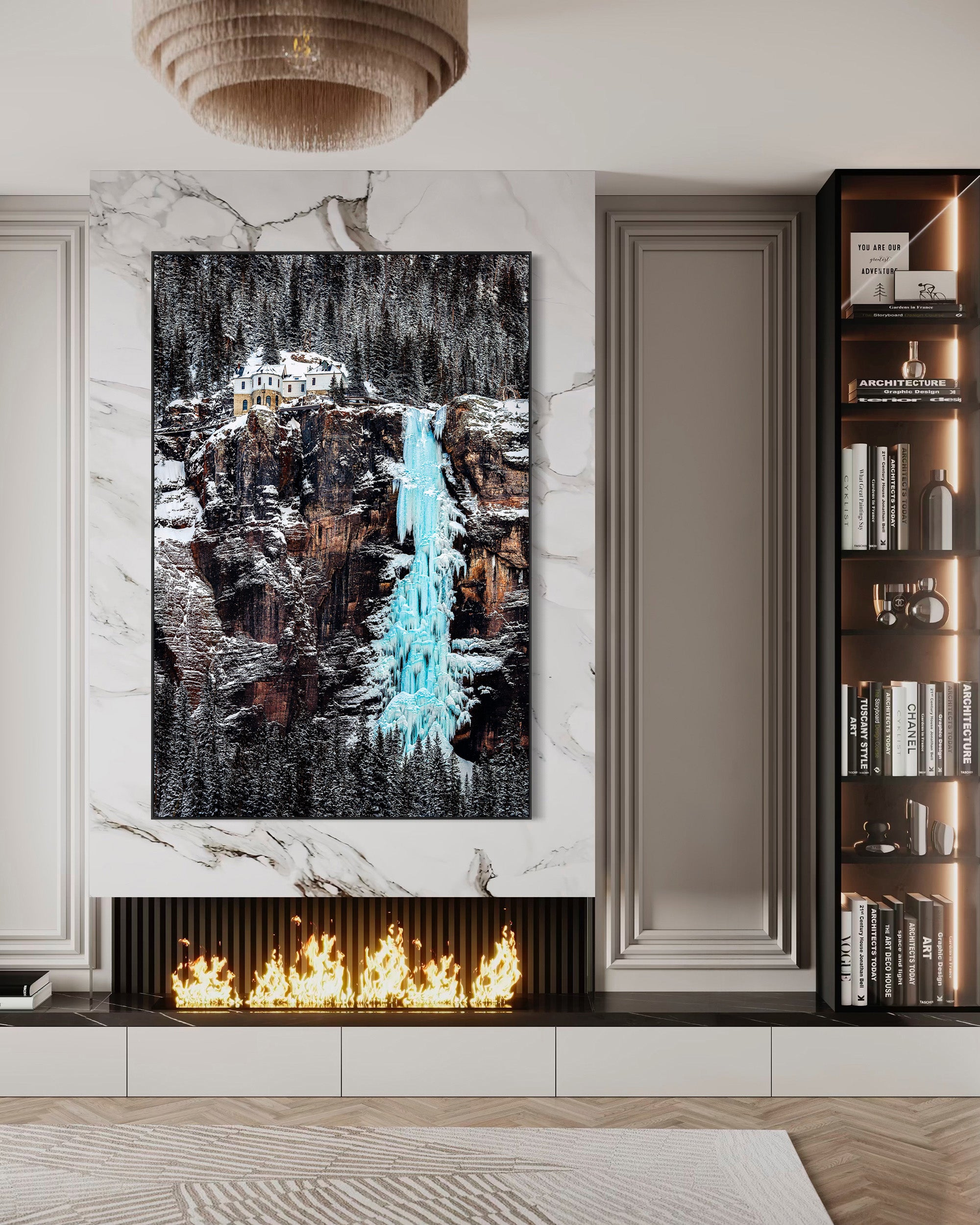 Framed artwork of a mountain landscape with a blue waterfall in a modern living room.